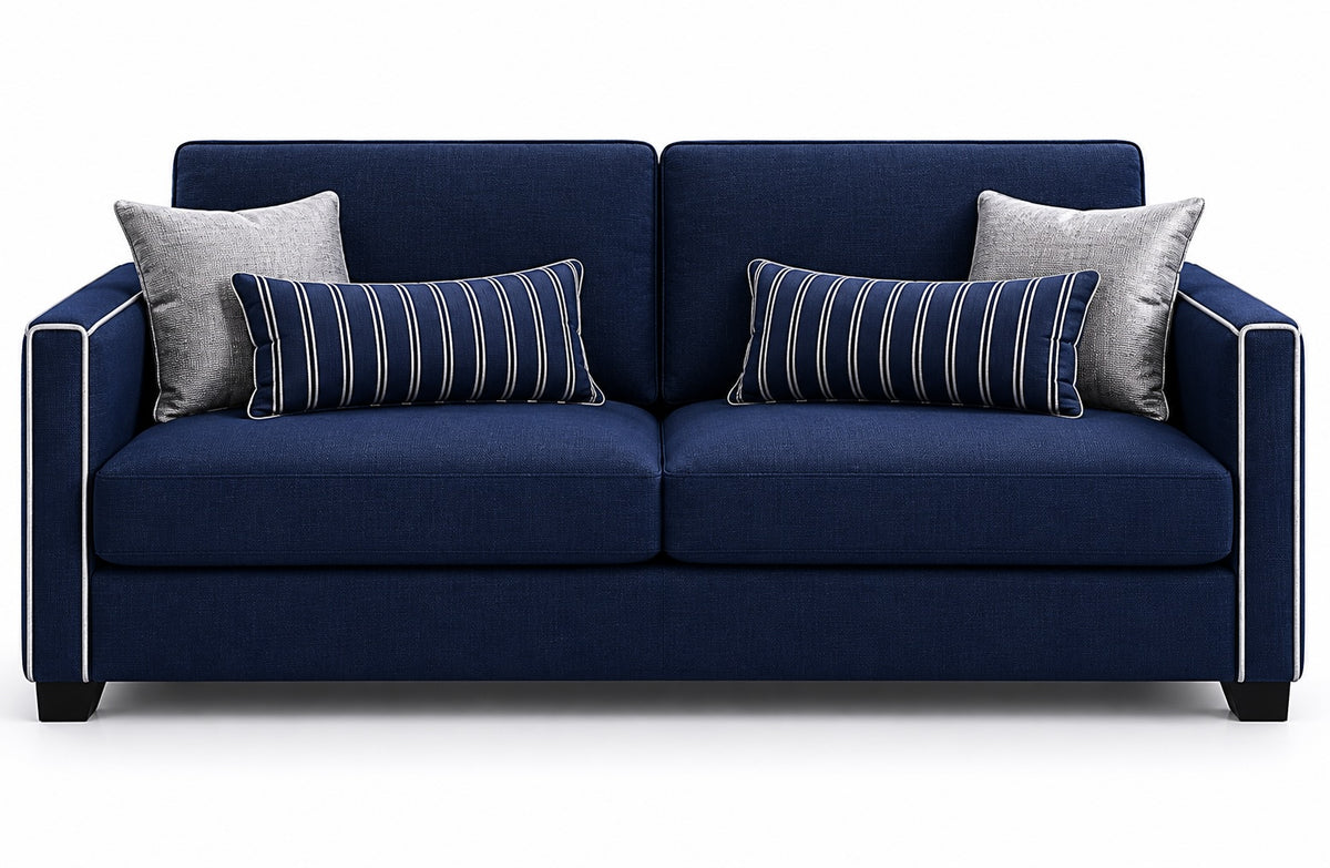 Das Schlafsofa Fleur überzeugt durch sein elegantes Design in seine Blauen Stoff mit stilvollen Seitenelementen in warmem Cognac-Ton.